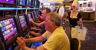 Relax Gaming baccarat live table with betting controls and English dealer communication interface